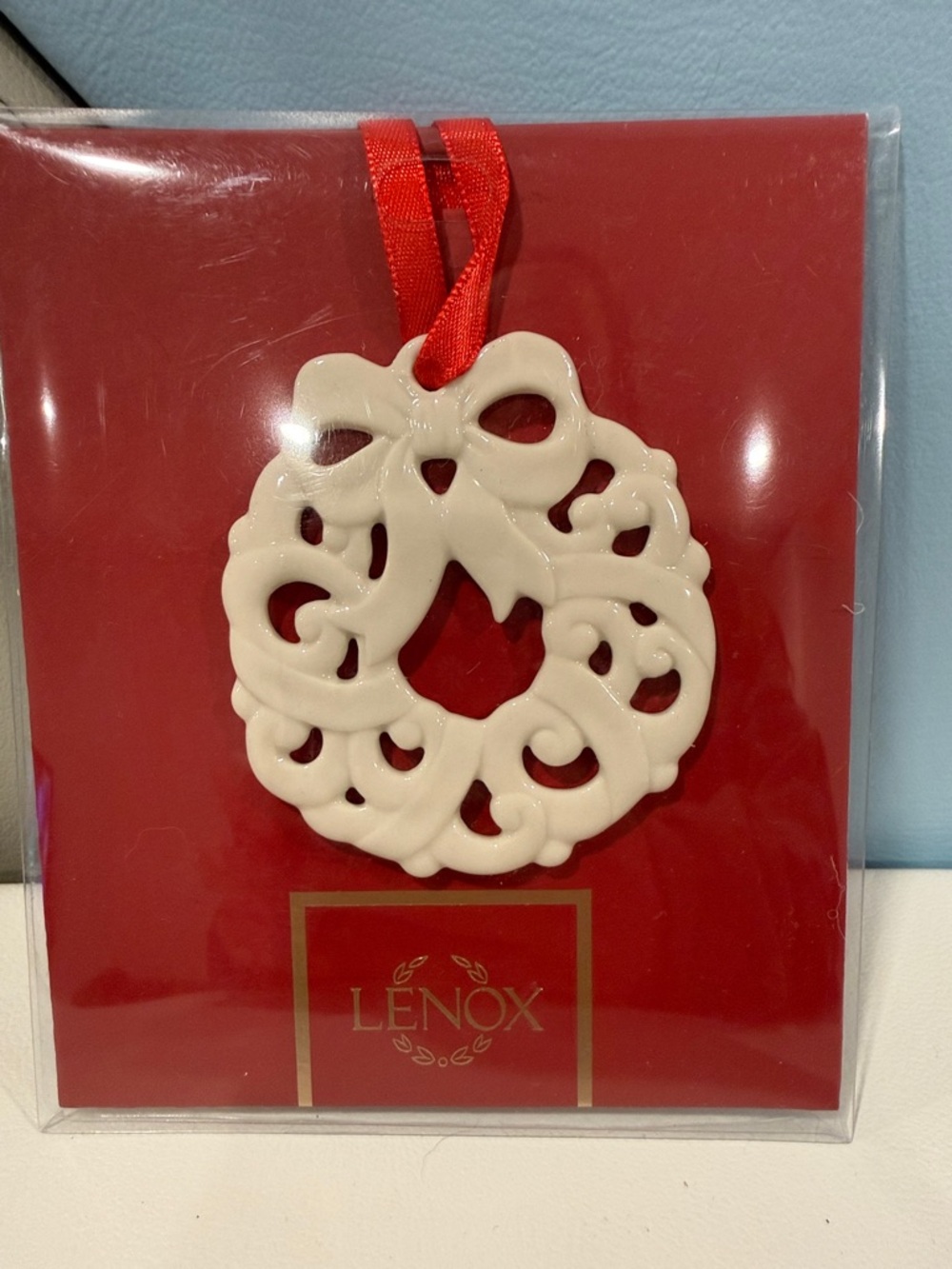 Lenox Cream Porcelain Holiday Wreath Ornament with Red Ribbon